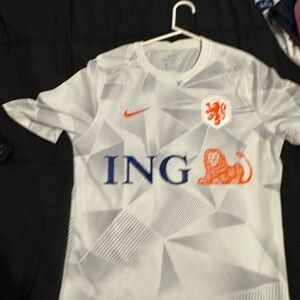 Nike White and Orange Soccer Jersey with Geometric Design